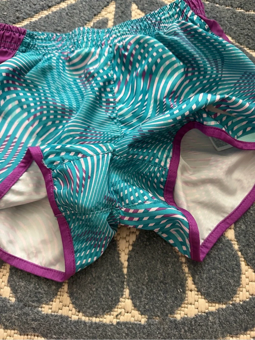 Bundle of Nike Girls Teal and Purple Wave-Print Athletic Shorts and Magenta